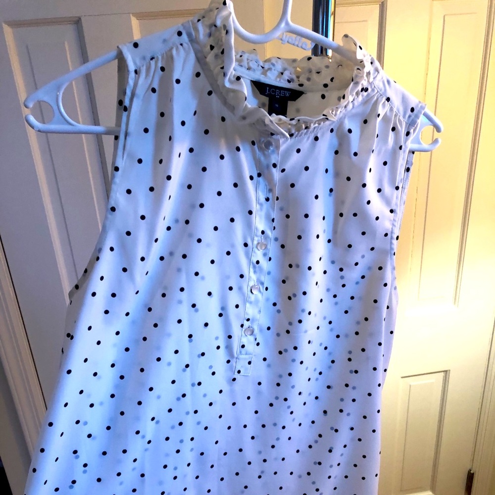 Jcrew top with ruffled neck line.